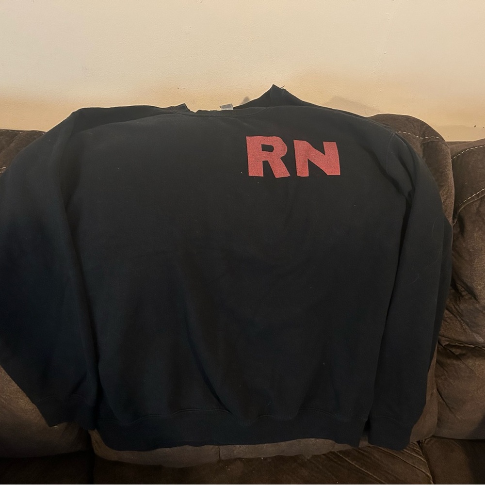 RN sweatshirt. Black with red RN